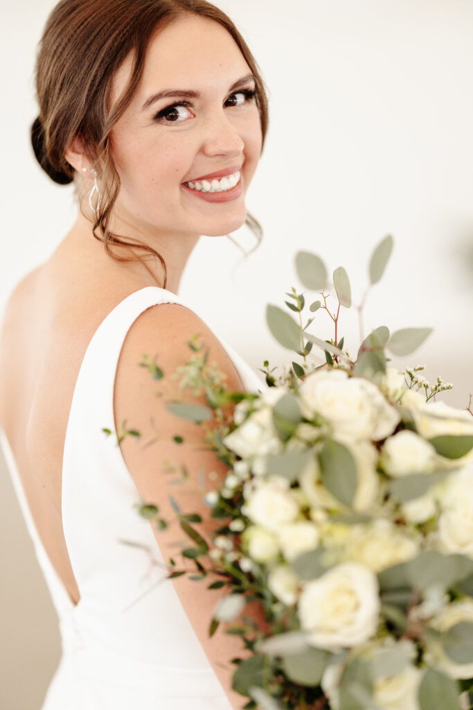 bride with bouquet at woodhaven