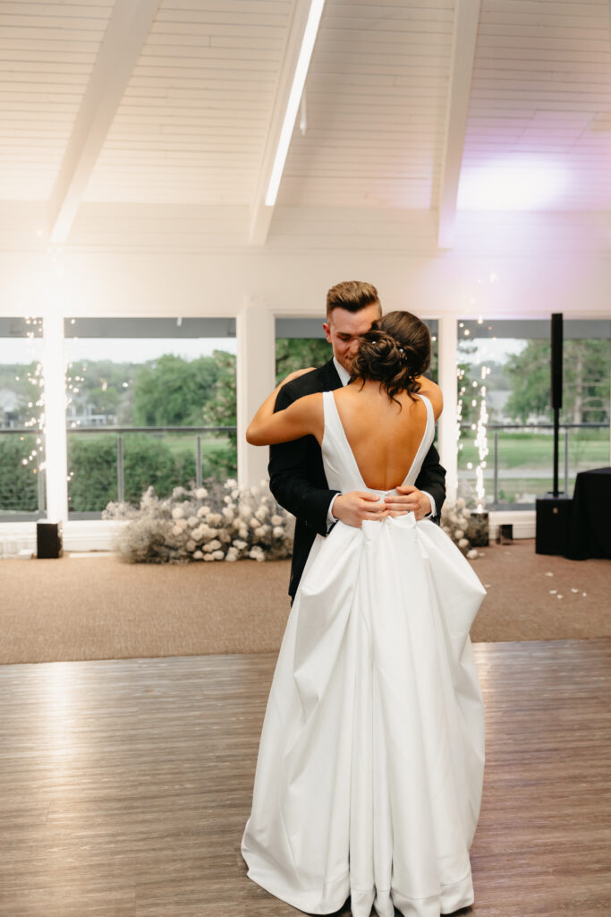 bride and groom first dance at royal golf club