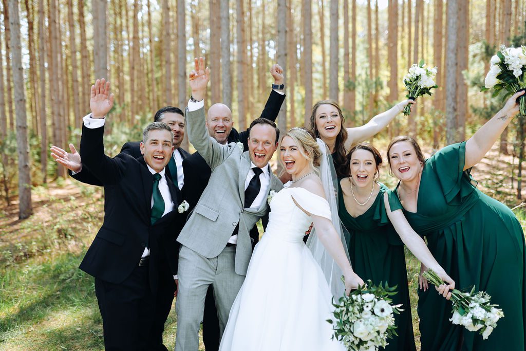 bride and groom with wedding party at pinewood