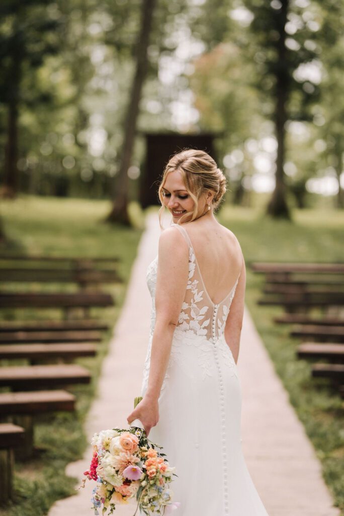 Bride at Dixons Apple Orchard wedding venue in Eau Claire Wisconsin