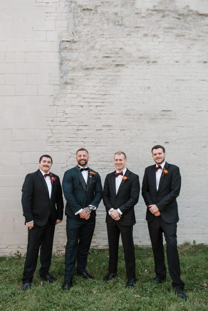 Groomsmen at North Garden Theater wedding venue in St Paul Minnesota