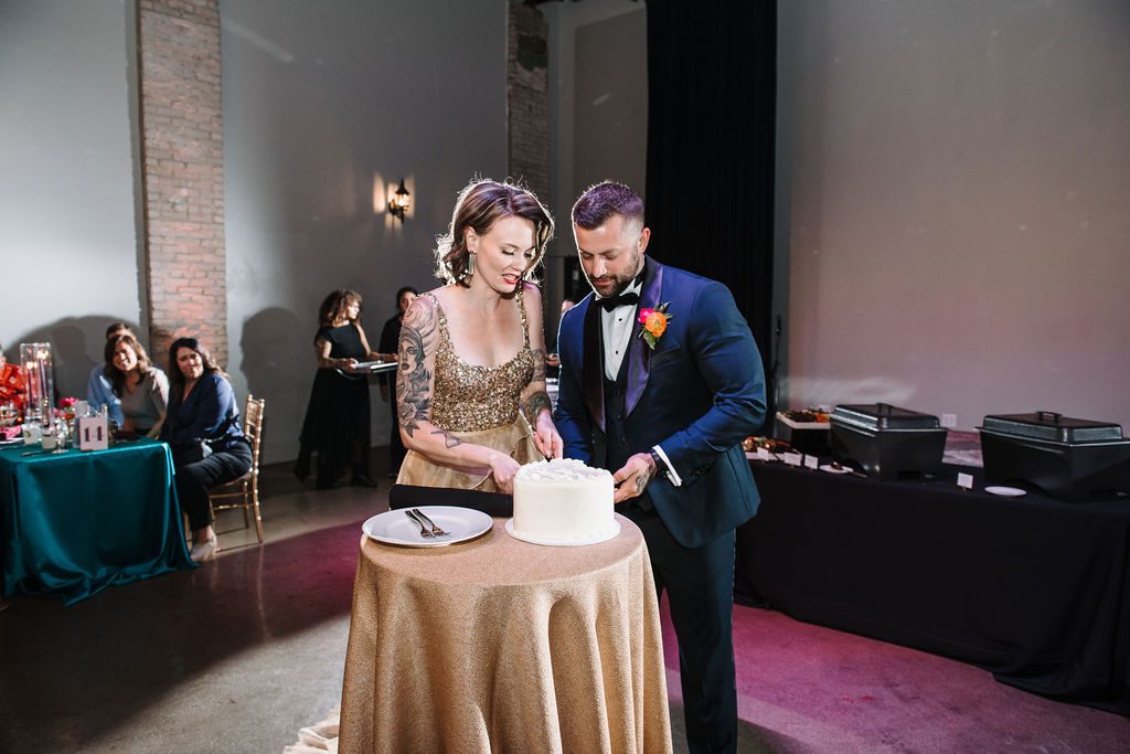 Cake cutting at North Garden Theater wedding venue in St Paul Minnesota