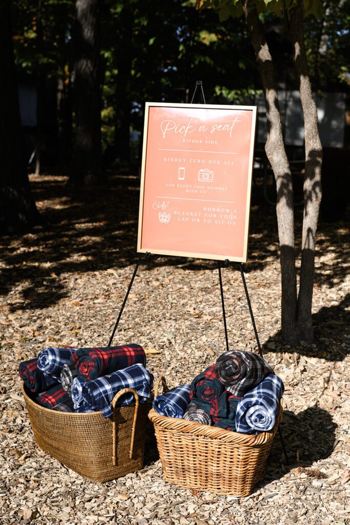 Ceremony blankets at Camp Fire Minnesota wedding venue