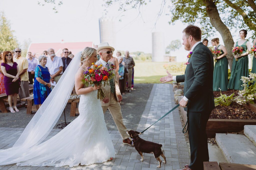 Wedding ceremony at Pondview Farm wedding venue in Cambridge Minnesota