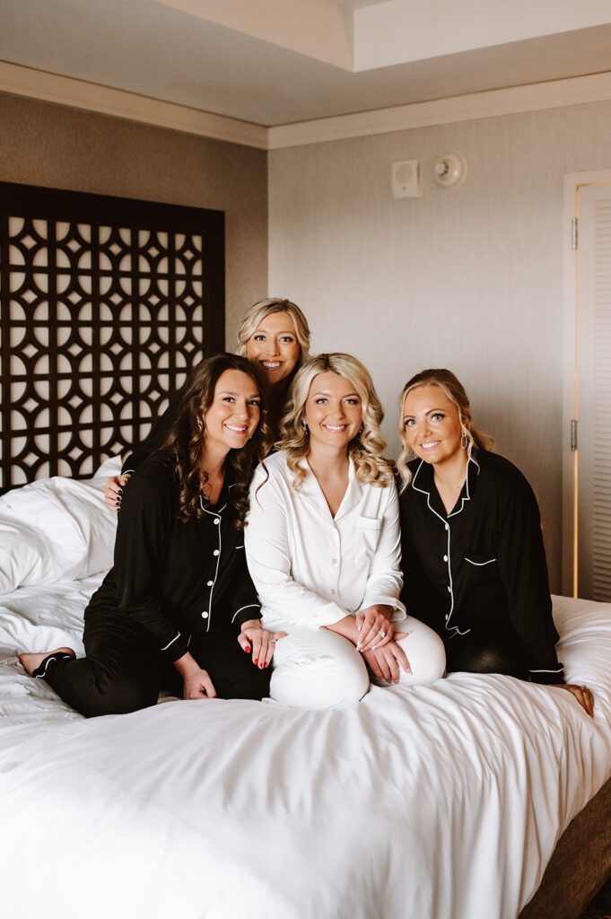 Bridesmaids getting ready photos at Brackett's Crossing country club in Lakeville Minnesota