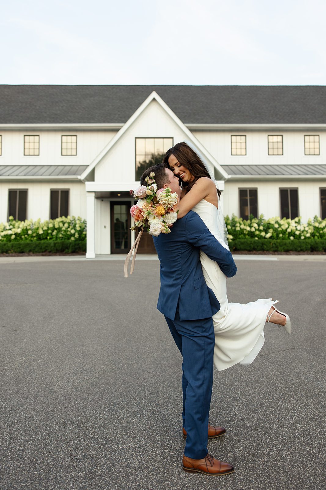 Bride and Groom outside Hutton House