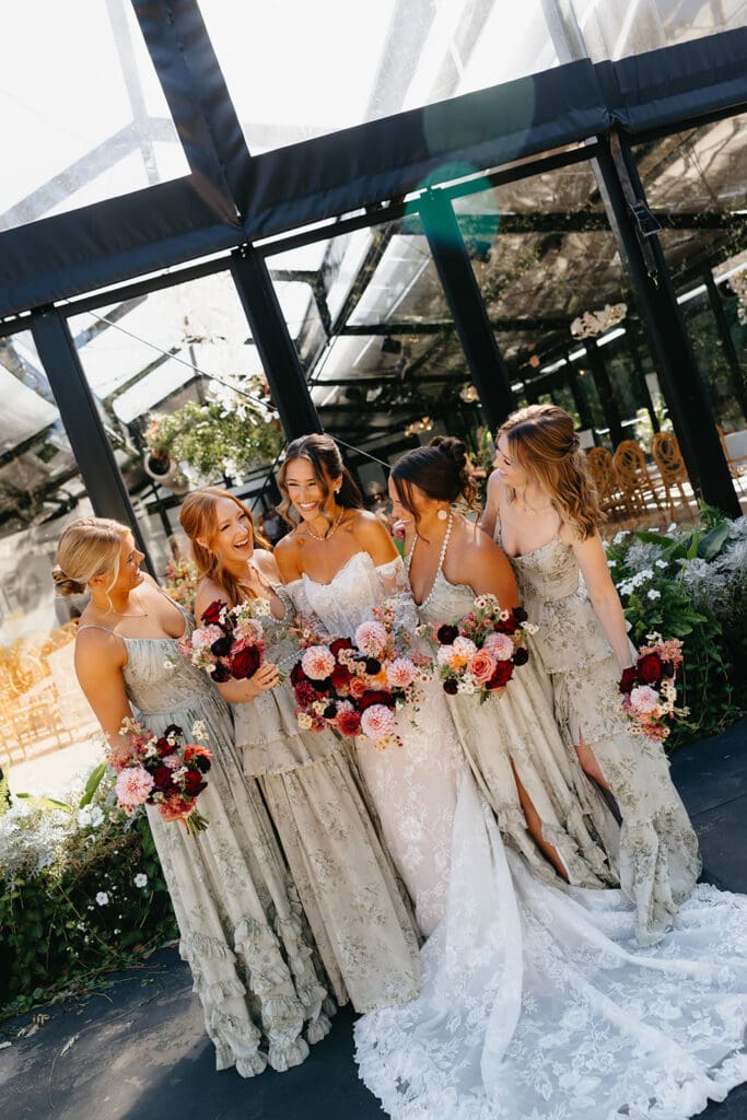 Bride and bridesmaids at Woodland Glasshaus Wedding at Bavaria Downs in Chaska Minnesota